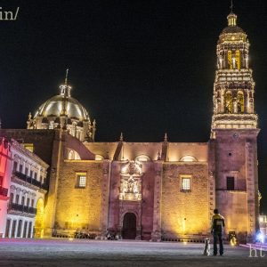 Man his dog admire the Catedral Zacatecas
